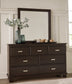 Covetown King Panel Bed with Mirrored Dresser, Chest and Nightstand