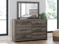 Graystorm Queen Panel Bed with Mirrored Dresser, Chest and Nightstand