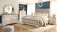 Realyn King Sleigh Bed with Mirrored Dresser, Chest and 2 Nightstands